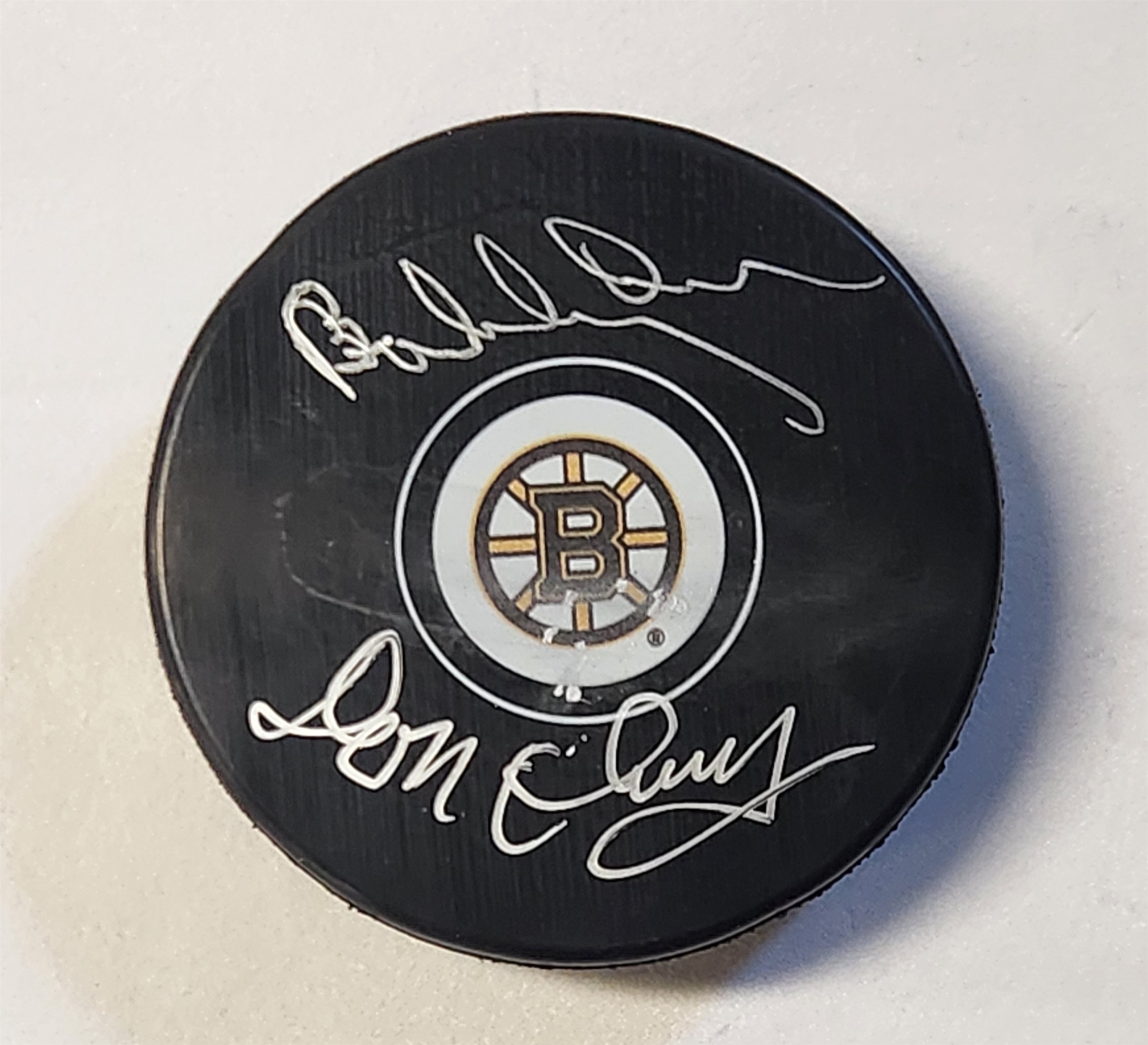 Bobby Orr & Don Cherry Dual Signed Boston Bruins Hockey Puck (Flawed)