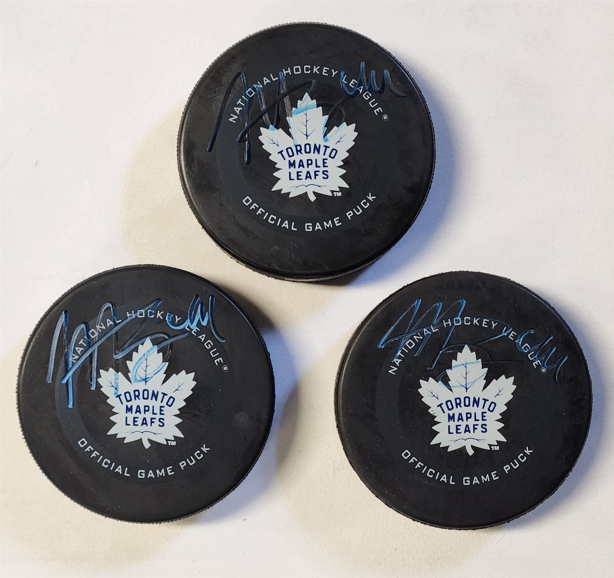 Morgan Rielly Autographed Toronto Maple Leafs Hockey Pucks Lot Of 3 (Flawed)