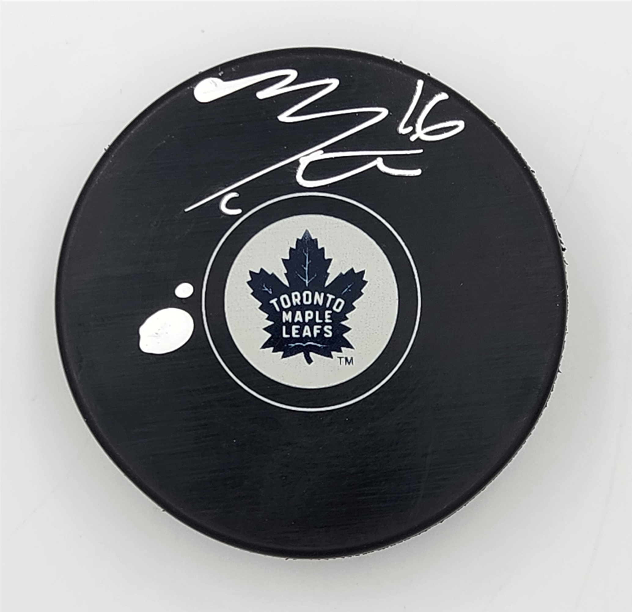 Mitch Marner Autographed Toronto Maple Leafs Hockey Puck (Flawed)